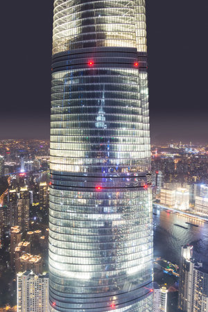 Editorial: SHANGHAI, CHINA, April 16, 2019 - View of the Shanghai Tower at night seen from the Jin...