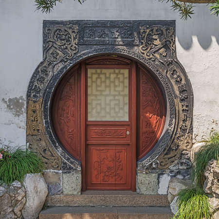 Editorial: SHANGHAI, CHINA, April 18, 2019 - Beautifully decorated door in the Yuyuan Garden in Shanghaiのeditorial素材