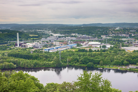 Editorial: HAGEN, NORTH RHINE-WESTPHALIA, GERMANY, MAY 23, 2022 - Helicopter view of industries along the Ruhr in Hagen seen from Hohensyburgのeditorial素材
