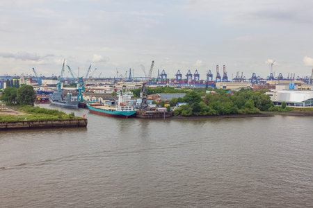 Editorial: HAMBURG, GERMANY, JUNE 1st, 2022 - The Elbe with the Port of Hamburg, seen from the...