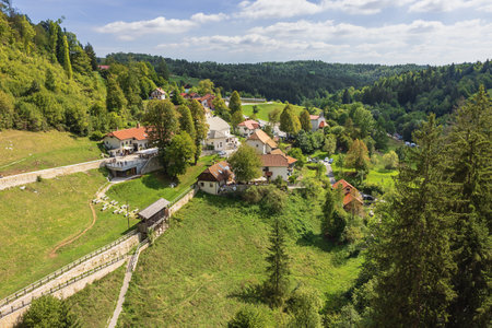 Editorial: PREDJAMA, SLOVENIA, SEPTEMBER 13, 2022 - A view of Predjama village seen from the castle above the villageのeditorial素材