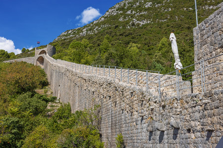 The stairs of the City Wall above Ston, seen from a side platformの写真素材