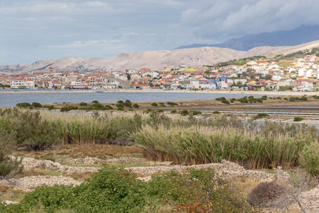 Editorial: PAG, DALMATIA, CROATIA, SEPTEMBER 29, 2022 - Pag and its salt laguna, seen from the old townのeditorial素材