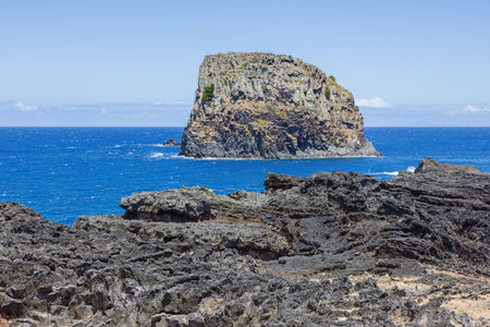 The island of Porto da Cruz, in front of the village on the north coast of Madeiraの写真素材