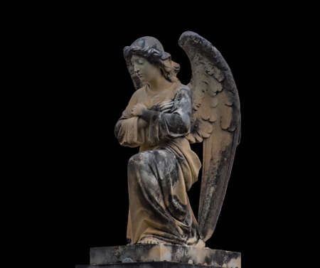 Antique medieval statue of a cemetery angelの写真素材