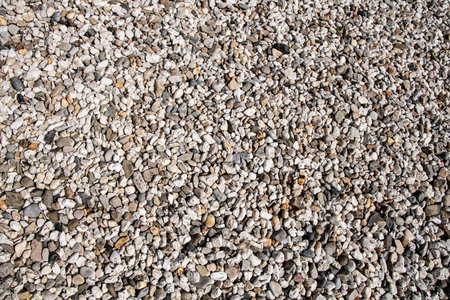 Brown stone grit scree for background. Brown gravel stone texture, granite gravel, rocks crushed for...
