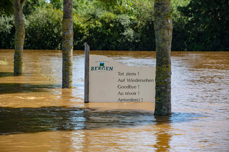 Aijen, Limburg, The Netherlands, July 17, 2021 - Landscape with flooded river Maas in Bergen - North...