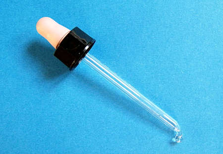 Pipette over light blueの写真素材