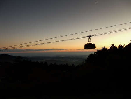 cable car and view on mountain at sunset timeの写真素材