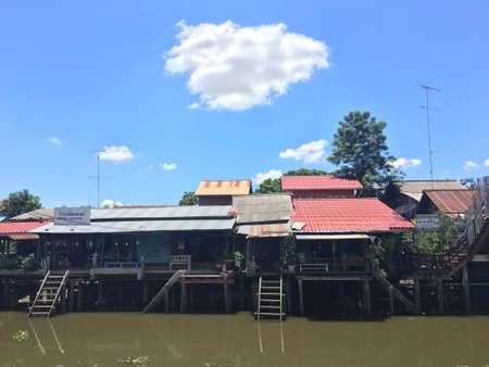 beautiful landscape of village lifestyle at waterfront Thailand on clear sky dayのeditorial素材