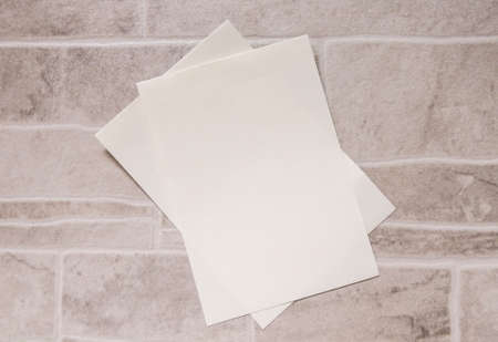 paper note on tile texture with note spaceの写真素材