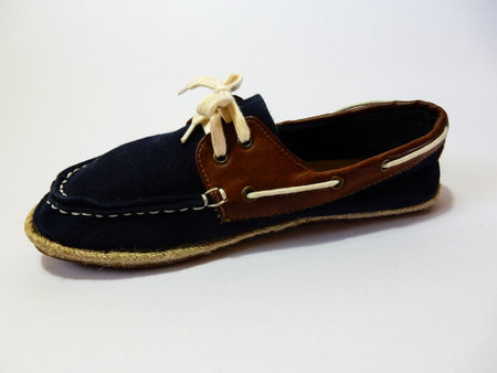 blue shoes laces on white backgroundの写真素材