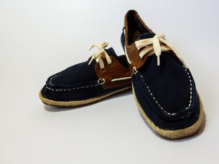 blue shoes laces on white backgroundの写真素材