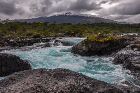 P?trohu? beautiful waterfalls with Osorno Volcano behind, Chile.の写真素材