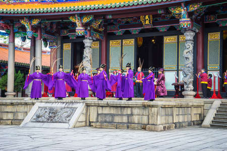 Taipei ,Taiwan - October 17,2015 : Chinese people performing traditional Chinese ceremony in Confucius temple on October 17, 2015 in Taipei ,Taiwan.のeditorial素材