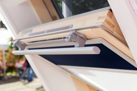 Closeup of modern open skylight (mansard window)の写真素材
