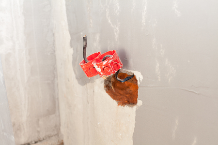 Wall power socket, plastic electrical junction box with electric wiresの写真素材