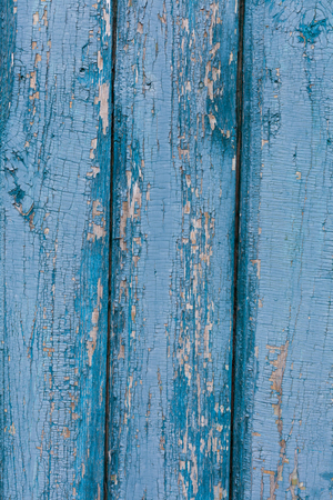 Old Shabby Wooden Planks with cracked color blue paintの写真素材