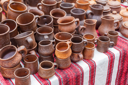 Ukrainian traditional handmade ceramic on decorative towel の写真素材
