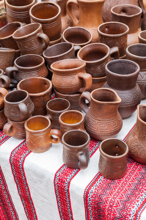 Ukrainian traditional handmade ceramic on decorative towel の写真素材