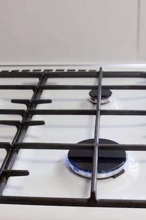 Close up image of fire from gas kitchen stoveの写真素材