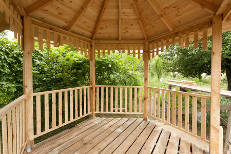 Inside of wooden gazebo under constructionの写真素材