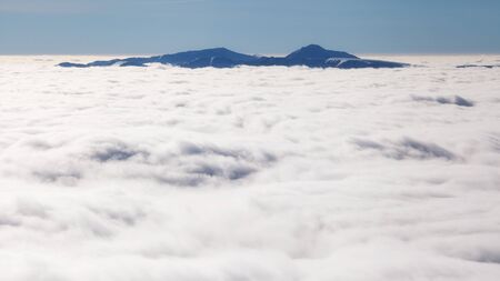 Winter Carpathians tightened mist. Ukraineの写真素材