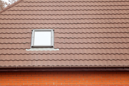 Stone Coated Metal tile Roof with skylight (roof window)の写真素材