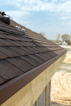 Closeup of asphalt roof shinglesの写真素材