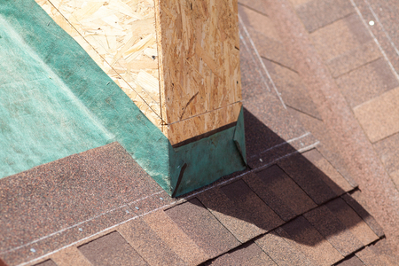 Clos up of tiled roof with shingles and vapor control layer membraneの写真素材