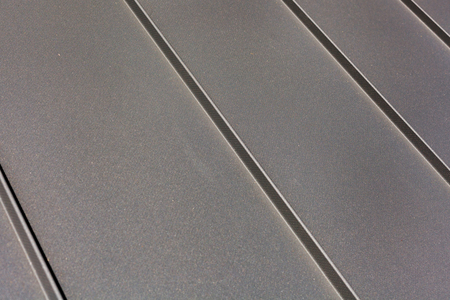 Close up roof sheet metal or corrugated roof of factory building or warehouse.の写真素材
