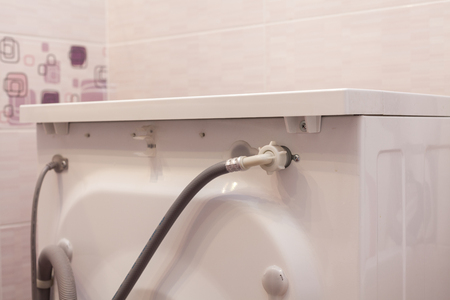 Connection of the washing machine to the water supply.の写真素材