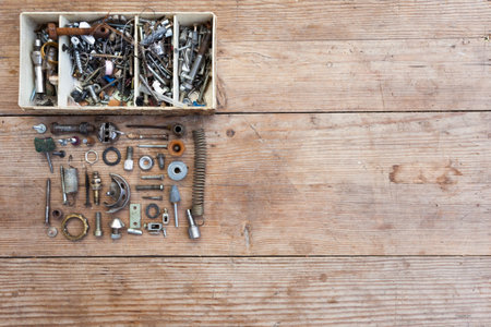 Screw tool box on wood background