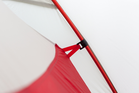 Closeup detail of camping tent. Aluminum Tent Poles and  rainflyの写真素材