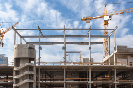 The process of building multi-storey parking for cars. Concrete interior of unfinished parking areaの写真素材