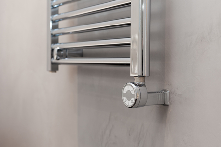 Thermostat for the towel warmer in the bathroomの写真素材