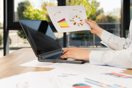 Cropped profile side view lady in her formalwear shirt she sit behind desktop table in loft interior display look at blank with important corporate informationの写真素材