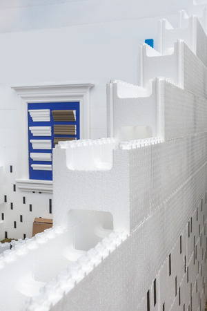 Side view vertical photo of unfinished wall in cozy comfort houseの写真素材