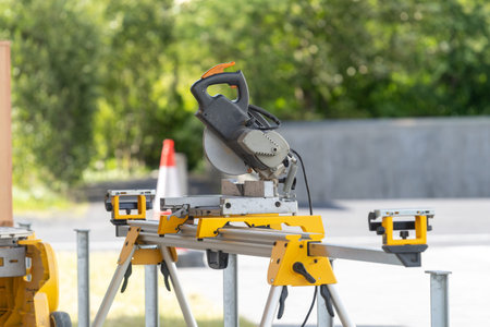 Photo of cutting circular saw standing on the street ready for work