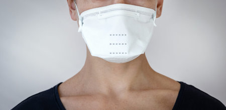 Epidemic and pandemic concept. Panoramic and cropped view of young adult woman in white medical and...