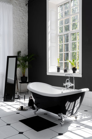 Vertical photo of modern interior design in contemporary apartment with mirror, classic bath, large...