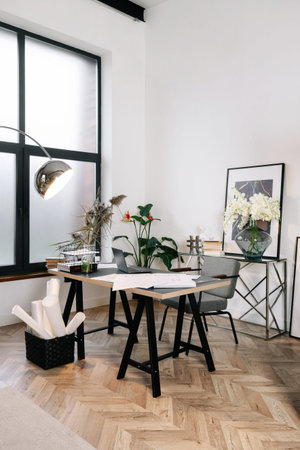 Remote business concept. Vertical view of home office in modern house with contemporary interior...