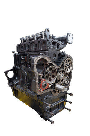 Tractor motor isolated on white copy space background, vertical shot. Engine part of harvester...