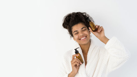 Beauty, skin care, dermatology, cosmetology, advertising concept. Dreamy and happy african american...