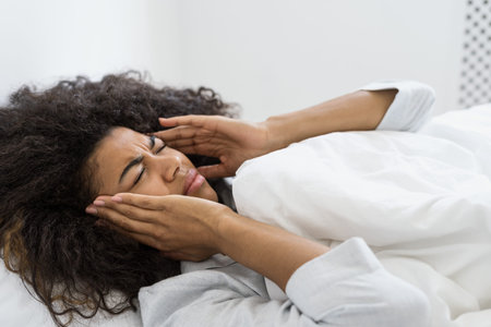 Healthcare and health problem concept. Portrait of sick young or exhausted african american woman...