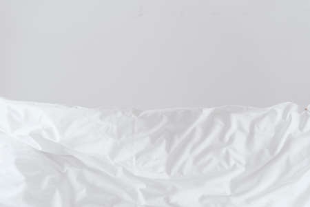 Closeup of hypoallergenic white lines on bed, contemporary hotel room details, personal comfort idea, bedding concept, freshness idea, cozy morningの写真素材