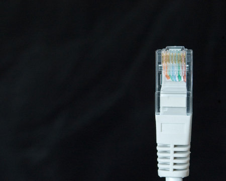A cable company digital telephone connection cable end.