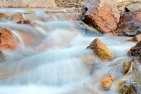 A Rocky Mountain stream in late winter.の写真素材