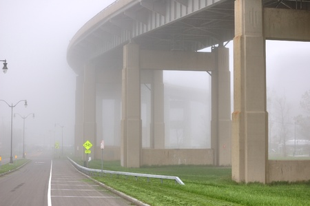 Buffalo New York Skyway bridge leading into downtown Buffalo with fog.の写真素材