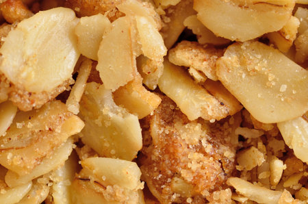A closeup macro of yogurt topping of nuts for background or copy space.